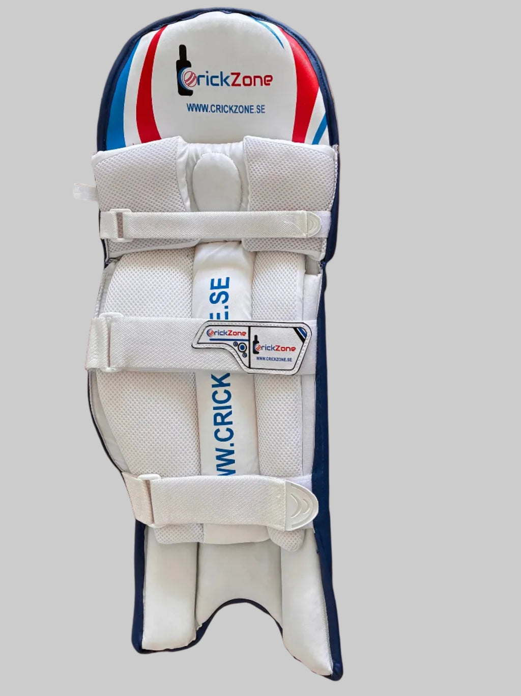 White protective gear with red, blue, and black accents on a wooden floor.